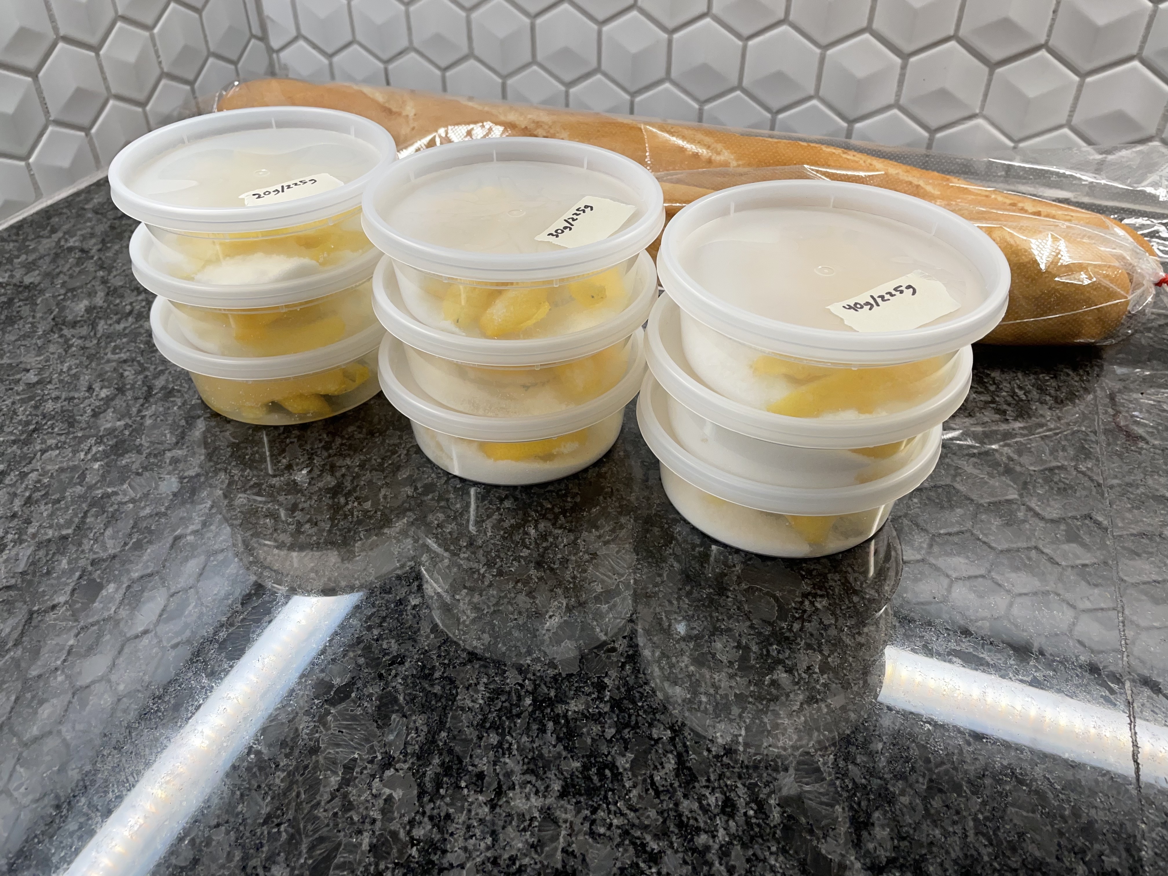 Containers of lemon oleo-saccharum